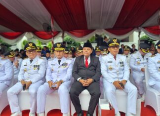 Penjabat Bupati Tapanuli Utara Dr. Dimposma Sihombing, S.Sos, MAP Hadiri Upacara Peringatan Hari Otonomi Daerah XXVIII Tahun 2024