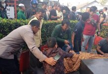 Polsek Cibinong Bersama Team INAFIS Polres Bogor Lakukan Olah TKP Terkait Penemuan Mayat di Depan Gerbang BRIN Cibinong
