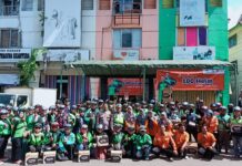Rumah Zakat Distribusikan 100 Helm untuk Driver Ojol Tangerang