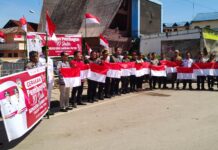 Polres Toba Bersama Forkopimda Bagikan 10 Juta Bendera Merah Putih