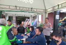 Hari Bhayangkara ke-79, Polisi Layani Pemeriksaan Kesehatan Ratusan Pengemudi Ojek Online di Kota Tangerang