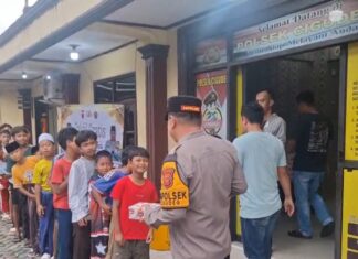 Polsek Cigudeg Gelar Jumat Berkah Dan Bagi Takjil Gratis di Hari Kedua Ramadan 1447 H